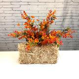 Straw Bale Orange Boxwood Arrangement